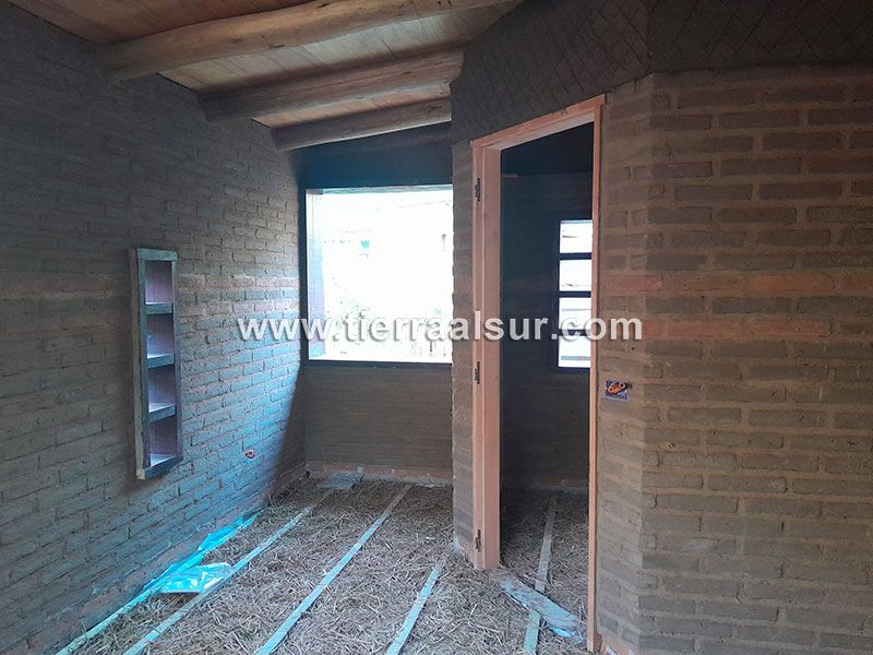 Aislación térmica en cerramiento inferior (piso).